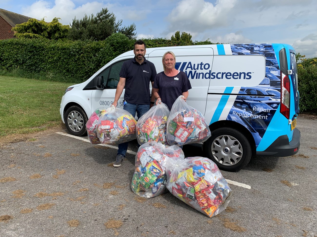 Auto Windscreens deliver crisp packets to Barlow Pre School.jpg