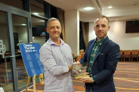 Auto Windscreens Jonathan Lord receives a runners up trophy from Sean Draycott